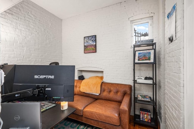293-295 Commonwealth Ave Unit 3C, Boston, MA 02111 - sitting room featuring brick wall