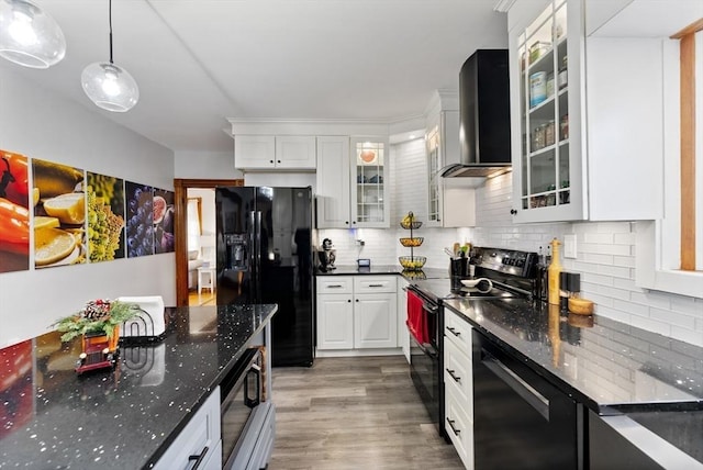 kitchen with dishwashing machine, light wood-style flooring, electric stove, black fridge with ice dispenser, and exhaust hood