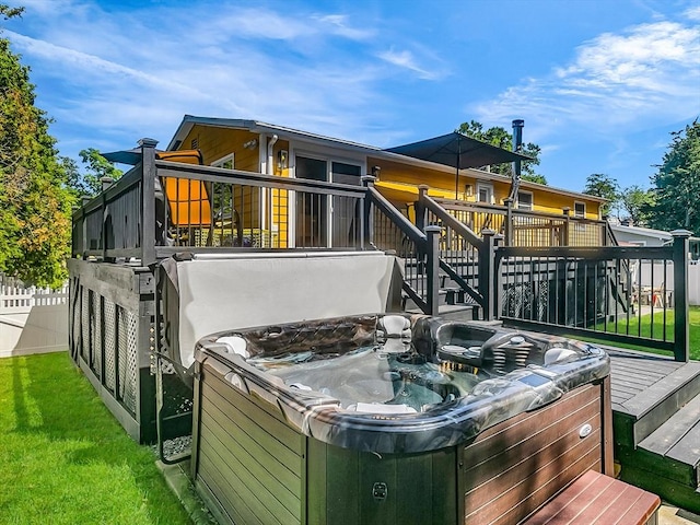 188 Atlantic St, Gloucester, MA 01930 - back of property featuring a hot tub and a wooden deck