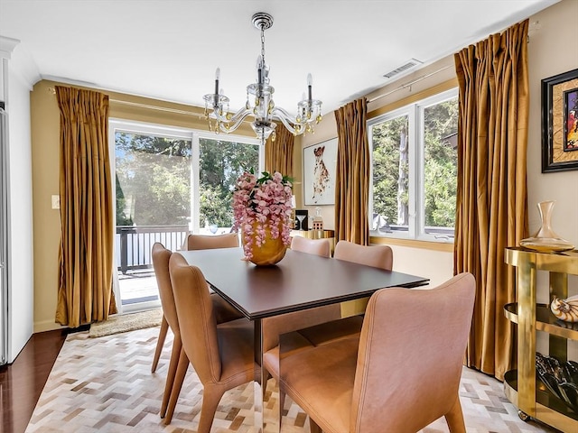 188 Atlantic St, Gloucester, MA 01930 - dining space with a chandelier and healthy amount of natural light