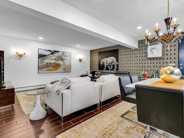 188 Atlantic St, Gloucester, MA 01930 - living room with a chandelier, wood finished floors, recessed lighting, a baseboard radiator, and an accent wall