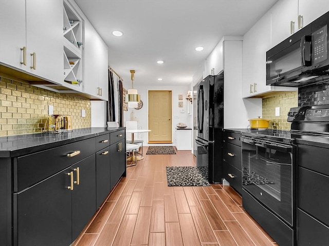 188 Atlantic St, Gloucester, MA 01930 - kitchen featuring black appliances, white cabinetry, dark countertops, open shelves, and recessed lighting