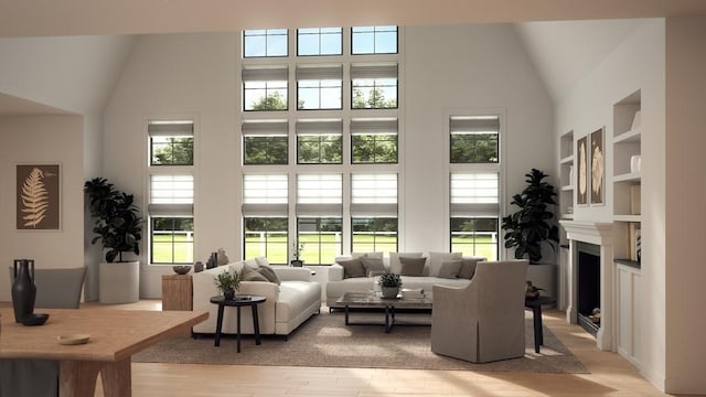46 Buttonwood Ln Unit 46, Ipswich, MA 01938 - living room featuring light wood-type flooring, a fireplace, and high vaulted ceiling