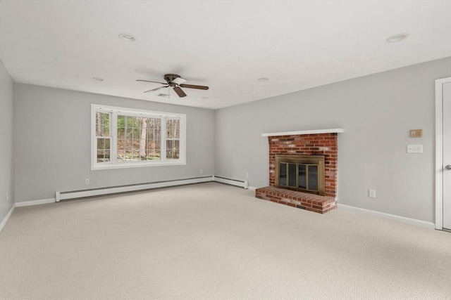 unfurnished living room featuring carpet, baseboards, ceiling fan, and baseboard heating