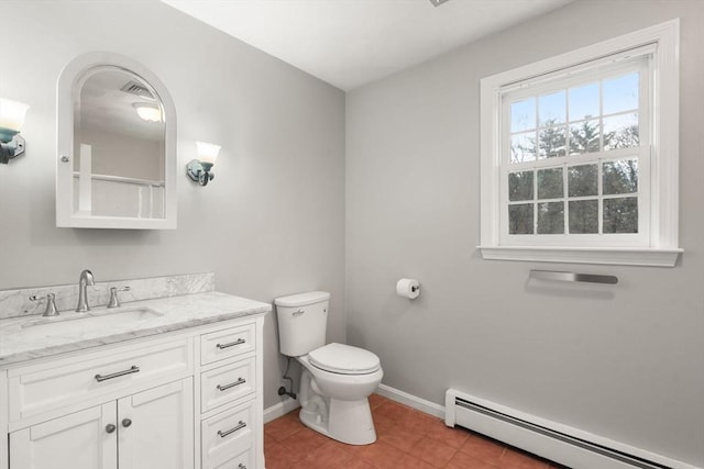 full bath with vanity, toilet, baseboards, tile patterned floors, and a baseboard heating unit