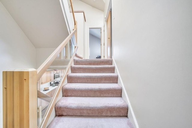 222 Algonquin Unit 222, Ashland, MA 01721 - staircase with carpet, baseboards, and lofted ceiling