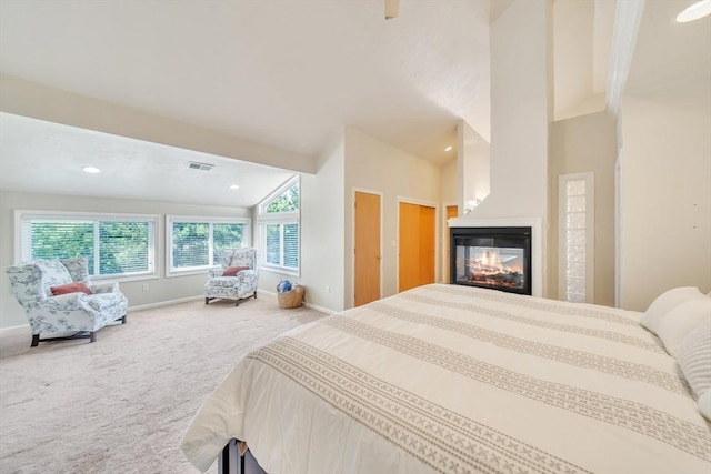 222 Algonquin Unit 222, Ashland, MA 01721 - bedroom with carpet flooring, baseboards, lofted ceiling, a multi sided fireplace, and recessed lighting