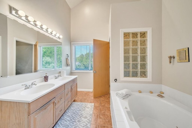 222 Algonquin Unit 222, Ashland, MA 01721 - bathroom featuring double vanity, a bath, tile patterned flooring, and a high ceiling