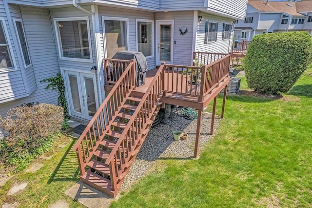 222 Algonquin Unit 222, Ashland, MA 01721 - deck featuring stairs, a yard, cooling unit, french doors, and grilling area