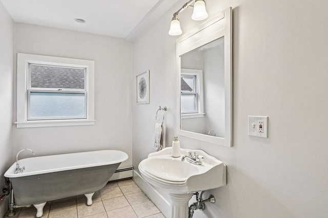 20 Lake St Unit 2, Somerville, MA 02143 - full bath with a soaking tub, tile patterned flooring, a baseboard radiator, and baseboards