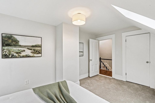 20 Lake St Unit 2, Somerville, MA 02143 - carpeted bedroom with a skylight and baseboards