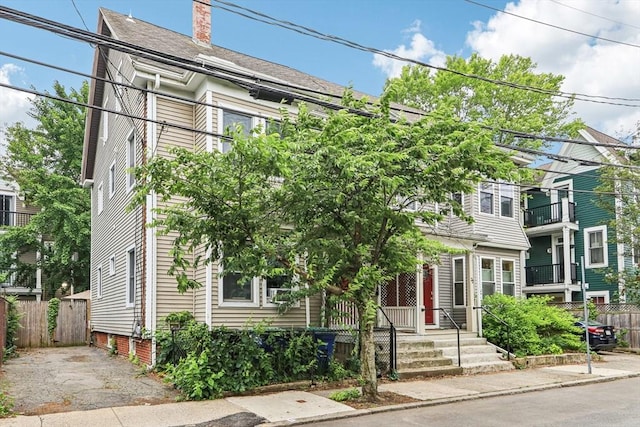 20 Lake St Unit 2, Somerville, MA 02143 - view of front of home with a chimney and roof with shingles