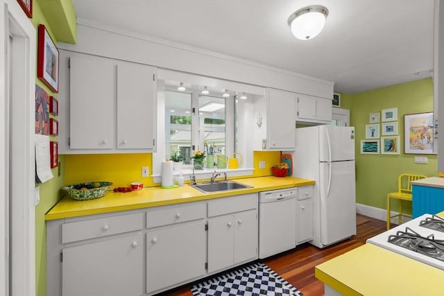21 Marsh St, Dedham, MA 02026 - kitchen featuring white appliances, white cabinetry, dark wood-type flooring, and light countertops