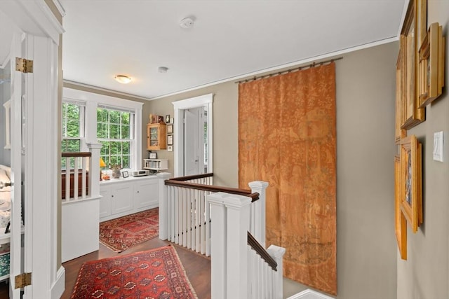 21 Marsh St, Dedham, MA 02026 - hall featuring an upstairs landing, wood finished floors, and ornamental molding
