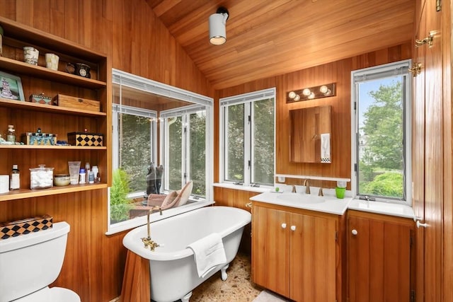 21 Marsh St, Dedham, MA 02026 - bathroom featuring a freestanding tub, vanity, vaulted ceiling, plenty of natural light, and wooden ceiling