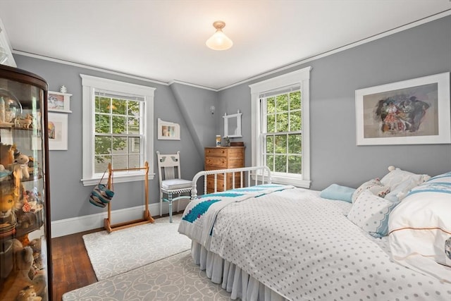 21 Marsh St, Dedham, MA 02026 - bedroom featuring wood finished floors and ornamental molding