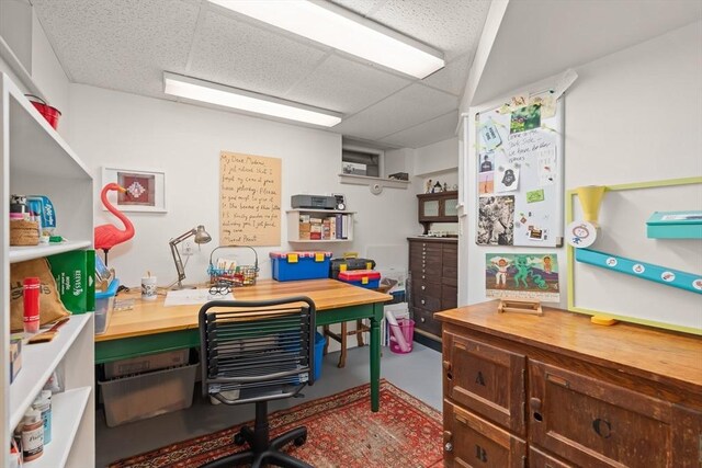 21 Marsh St, Dedham, MA 02026 - home office featuring a paneled ceiling and finished concrete flooring