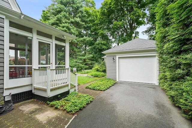 21 Marsh St, Dedham, MA 02026 - garage with asphalt driveway