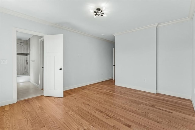 443 Central Ave, Needham, MA 02494 - unfurnished bedroom featuring light wood-style floors, baseboards, and ornamental molding