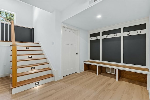 443 Central Ave, Needham, MA 02494 - mudroom with wood finished floors and baseboards