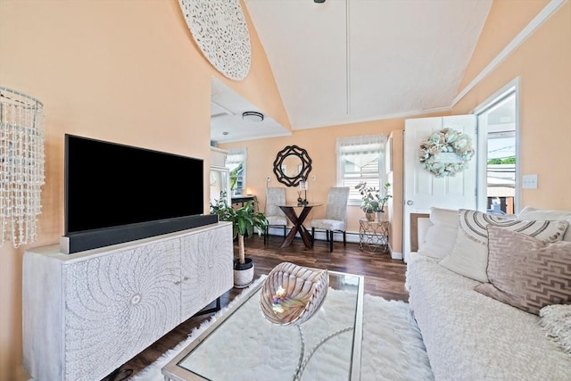 12 Moreland Ave Unit 1, Hull, MA 02045 - living area featuring vaulted ceiling, healthy amount of natural light, wood finished floors, baseboards, and crown molding