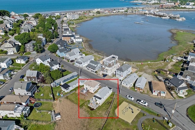 12 Moreland Ave Unit 1, Hull, MA 02045 - aerial view of property and surrounding area featuring a large body of water, nearby suburban area, and property boundaries highlighted