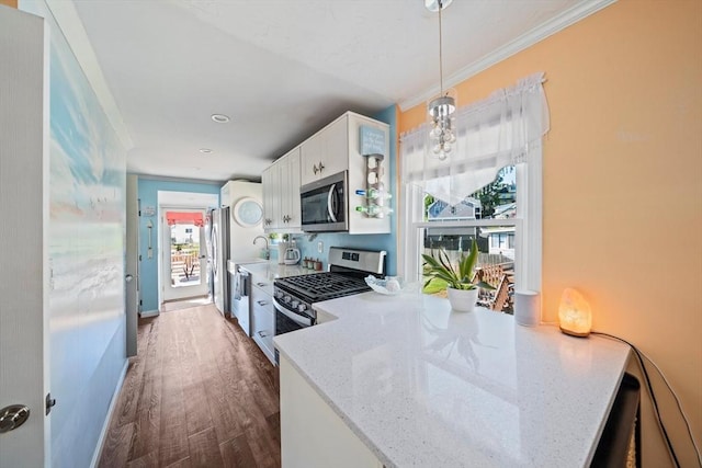 12 Moreland Ave Unit 1, Hull, MA 02045 - kitchen with stainless steel appliances, white cabinetry, dark wood-style flooring, crown molding, and a peninsula