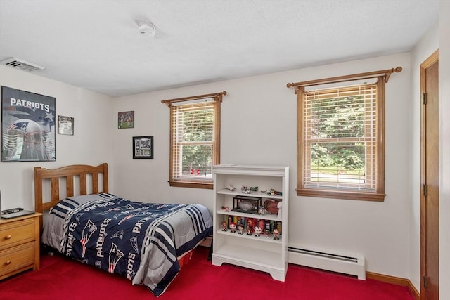 65 Martin Rd, Tewksbury, MA 01876 - carpeted bedroom with a baseboard radiator and baseboards