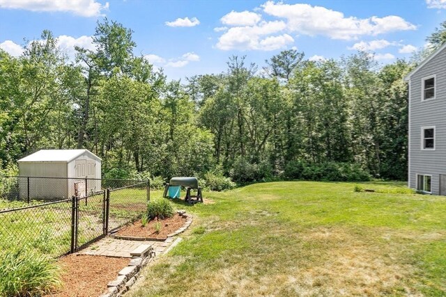 65 Martin Rd, Tewksbury, MA 01876 - view of yard with a gate and a storage shed