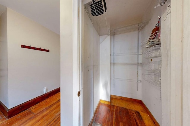 70 Revere St Unit 5, Boston, MA 02114 - walk in closet featuring hardwood / wood-style floors