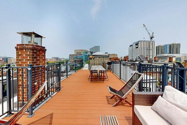 70 Revere St Unit 5, Boston, MA 02114 - wooden deck with a view of city