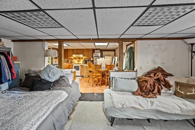 bedroom with a paneled ceiling