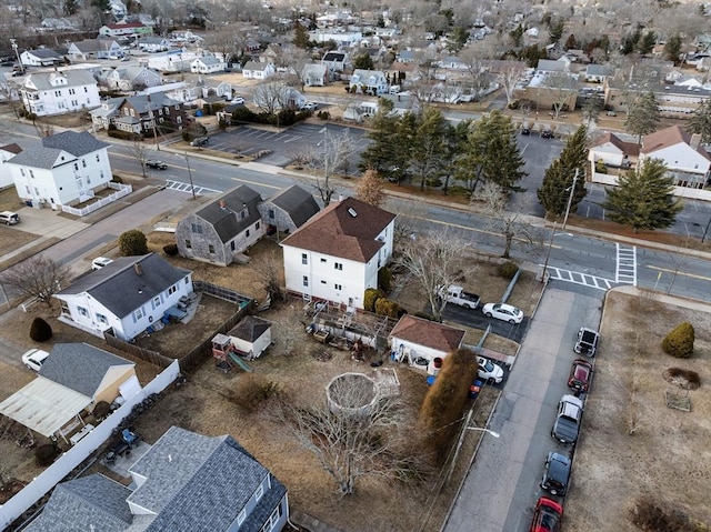 birds eye view of property with a residential view