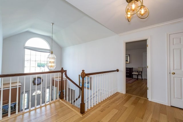 113 Sparrow Rd, Stoughton, MA 02072 - corridor with a chandelier, wood finished floors, an upstairs landing, and lofted ceiling