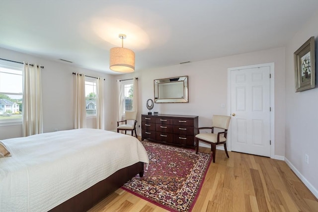 113 Sparrow Rd, Stoughton, MA 02072 - bedroom featuring light wood finished floors and baseboards