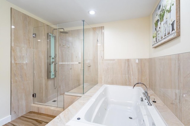 113 Sparrow Rd, Stoughton, MA 02072 - full bathroom with a shower stall, a garden tub, tile walls, and recessed lighting