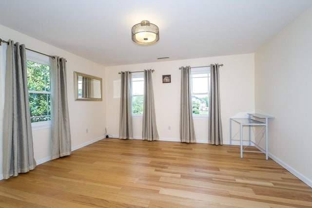 113 Sparrow Rd, Stoughton, MA 02072 - empty room with light wood-style flooring and plenty of natural light