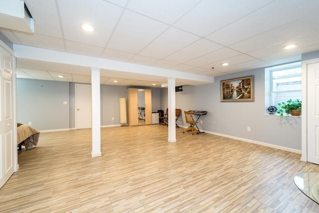 113 Sparrow Rd, Stoughton, MA 02072 - basement with light wood-style floors, a drop ceiling, and recessed lighting