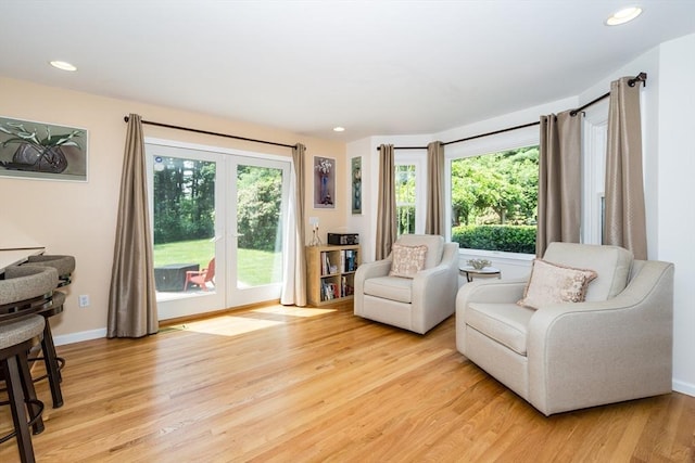 113 Sparrow Rd, Stoughton, MA 02072 - sitting room featuring light wood-style floors, recessed lighting, and french doors