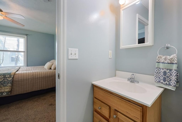 bathroom with vanity and a ceiling fan