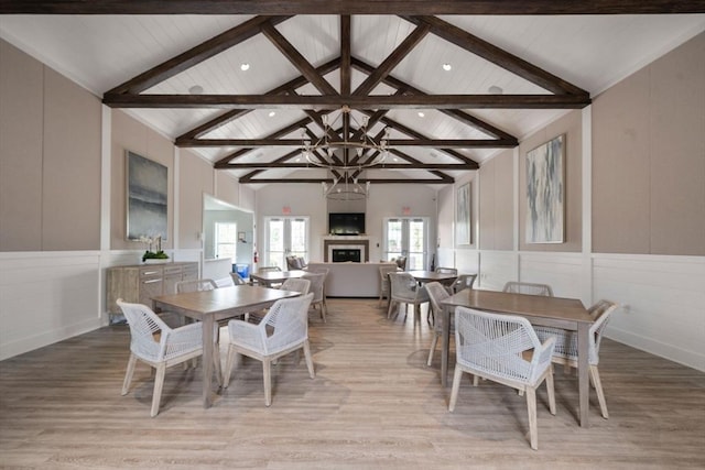 21 Snapping Bow, Plymouth, MA 02360 - dining room featuring a decorative wall, light wood-style floors, a fireplace, recessed lighting, and wainscoting