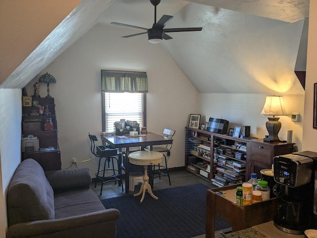 office space with lofted ceiling, ceiling fan, and wood finished floors