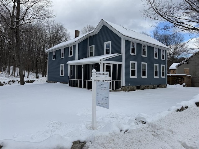 colonial house with a sunroom