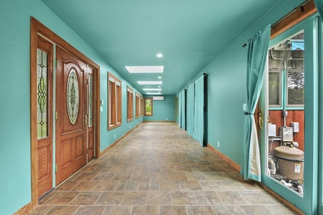 210 Plain Dr, Stoughton, MA 02072 - hallway with stone finish flooring and recessed lighting