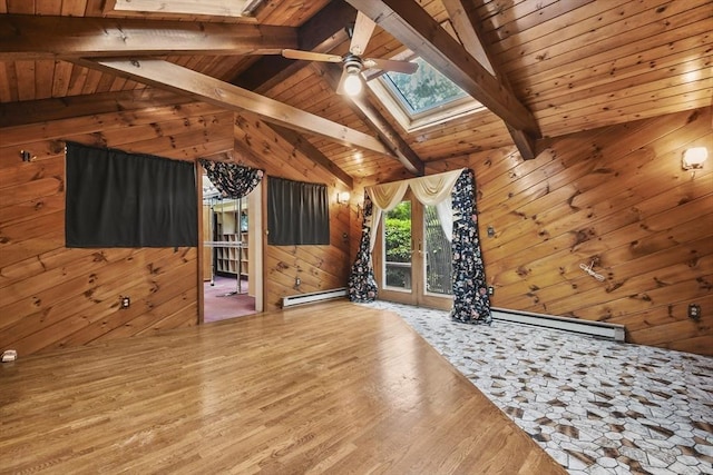 210 Plain Dr, Stoughton, MA 02072 - unfurnished living room with a skylight, baseboard heating, wood finished floors, a ceiling fan, and wood walls