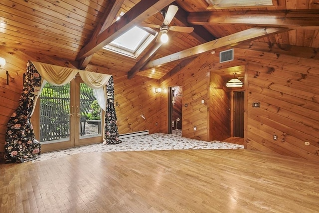 210 Plain Dr, Stoughton, MA 02072 - unfurnished living room featuring a skylight, hardwood / wood-style flooring, wooden walls, a ceiling fan, and wood ceiling
