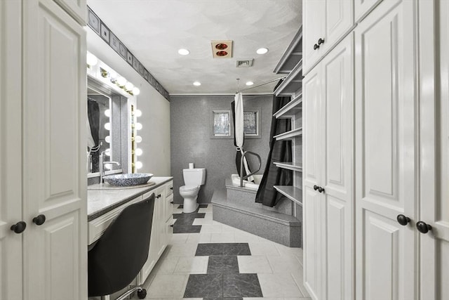 210 Plain Dr, Stoughton, MA 02072 - bathroom with vanity, recessed lighting, and tile patterned floors