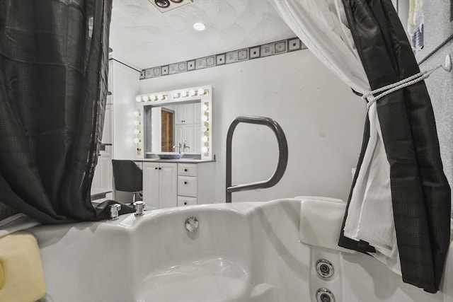 210 Plain Dr, Stoughton, MA 02072 - full bath with a tub to relax in and vanity