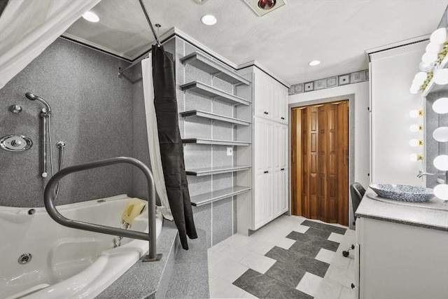 210 Plain Dr, Stoughton, MA 02072 - bathroom with a jetted tub, vanity, and recessed lighting