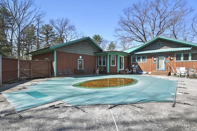 210 Plain Dr, Stoughton, MA 02072 - view of swimming pool featuring entry steps and a gate